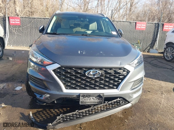 2019 Hyundai Tucson Value with VIN KM8J33A49KU860842, listed as a IAAI auction lot 41735224 with 57,197 mi miles. Bid and sale history available at carsss.com. Image 12.