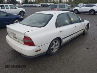 1994 Honda Accord EX with VIN JHMCD5655RC055152, listed as a IAAI auction lot 41432219 with 341,369 mi miles and . Bid and sale history available at carsss.com. Image 4.