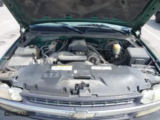 1999 Chevrolet Silverado 1500 LS with VIN 2GCEC19T5X1140995, listed as a IAAI auction lot 41879076 with 1 mi miles. Bid and sale history available at carsss.com. Image 10.