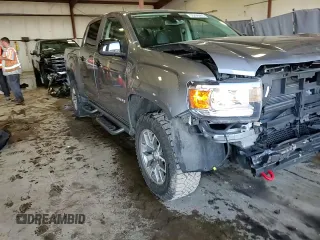 2022 GMC Canyon 4WD AT4 z VIN 1GTG6FEN0N1162393, wystawiony jako Copart lot #55286065 z przebiegiem 55 185 mil mil oraz Szkoda całkowita • Salvage title. Historia ofert i sprzedaży dostępna na DreamBid. Obrazek 14.