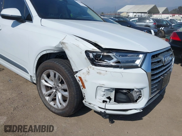 2019 Audi Q7 Premium with VIN WA1AAAF74KD004991, listed as a IAAI auction lot 42180183 with 53,188 mi miles and . Bid and sale history available at DreamBid. Image 6.