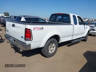 1997 Ford F-150 XL with VIN 1FTDX18W6VNB27227, listed as a IAAI auction lot 41858395 with 174,888 mi miles. Bid and sale history available at carsss.com. Image 4.