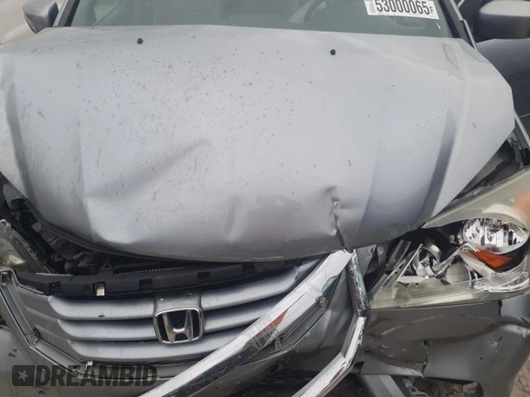 2009 Honda Odyssey EX-L z VIN 5FNRL38669B034578, wystawiony jako Copart lot #53000065 z przebiegiem 177 850 mil mil oraz Szkoda całkowita • Salvage title. Historia ofert i sprzedaży dostępna na DreamBid. Obrazek 12.