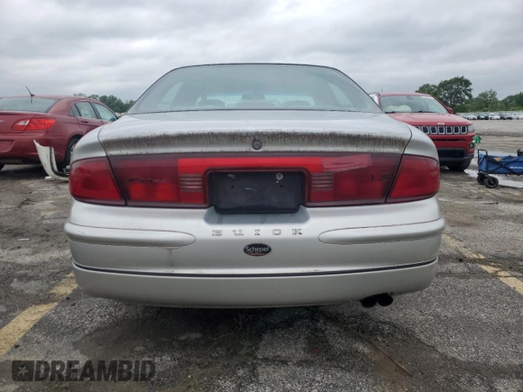 2002 Buick Regal LS with VIN 2G4WB52K321285571, listed as a Copart auction lot 57562465 with 91,352 mi miles and Salvage title. Bid and sale history available at DreamBid. Image 6.