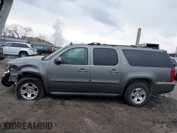 2007 GMC Yukon XL SLT with VIN 1GKFK16367J222143, listed as a IAAI auction lot 41676370 with 211,565 mi miles. Bid and sale history available at carsss.com. Image 15.