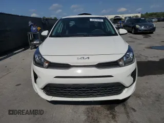 2023 Kia Rio S z VIN 3KPA24AD4PE561052, wystawiony jako Copart lot #55316785 z przebiegiem 94 184 mil mil oraz Nie do naprawy • Non repairable. Historia ofert i sprzedaży dostępna na DreamBid. Obrazek 5.