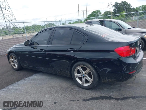 2015 BMW 3 Series 320i with VIN WBA3B1G57FNT05826, listed as a IAAI auction lot 42103193 with 128,800 mi miles. Bid and sale history available at carsss.com. Image 13.