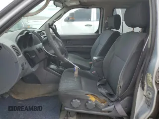 2003 Nissan Frontier SE z VIN 1N6ED29X33C413665, wystawiony jako Copart lot #43689245 z przebiegiem 188 345 mil mil oraz Szkoda całkowita • Salvage title. Historia ofert i sprzedaży dostępna na DreamBid. Obrazek 7.