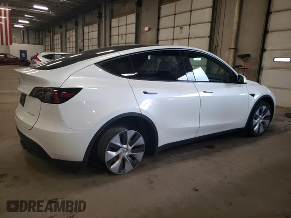 2023 Tesla Model Y Long Range z VIN 7SAYGDEE5PA067389, wystawiony jako Copart lot #54109625 z przebiegiem 24 849 mil mil oraz Szkody całkowita. Historia ofert i sprzedaży dostępna na DreamBid. Obrazek 3.