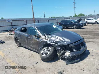 2020 Honda Civic LX with VIN 2HGFC2F6XLH505926, listed as a IAAI auction lot 42324085 with 110,079 mi miles and . Bid and sale history available at DreamBid. Image 1.
