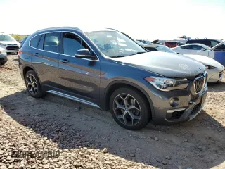 2017 BMW X1 xDrive28i with VIN WBXHT3C32H5F79403, listed as a Copart auction lot 50182775 with 71,003 mi miles and Salvage Title. Bid and sale history available at carsss.com. Image 4.