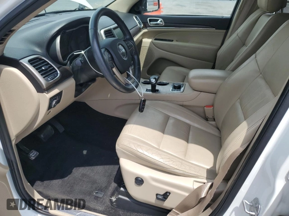 2014 Jeep Grand Cherokee Limited with VIN 1C4RJFBG2EC569780, listed as a Copart auction lot 61708755 with 69,058 mi miles and Salvage title. Bid and sale history available at DreamBid. Image 7.