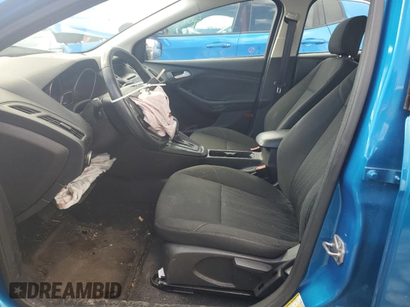 2017 Ford Focus SE with VIN 1FADP3F23HL203794, listed as a Copart auction lot 57202435 with 116,824 mi miles and Salvage title. Bid and sale history available at DreamBid. Image 7.