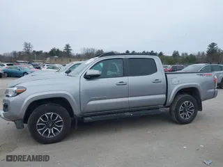 2020 Toyota Tacoma 4WD SR5 with VIN 3TMCZ5AN6LM306311, listed as a IAAI auction lot 41220025 with 67,806 mi miles. Bid and sale history available at carsss.com. Image 15.