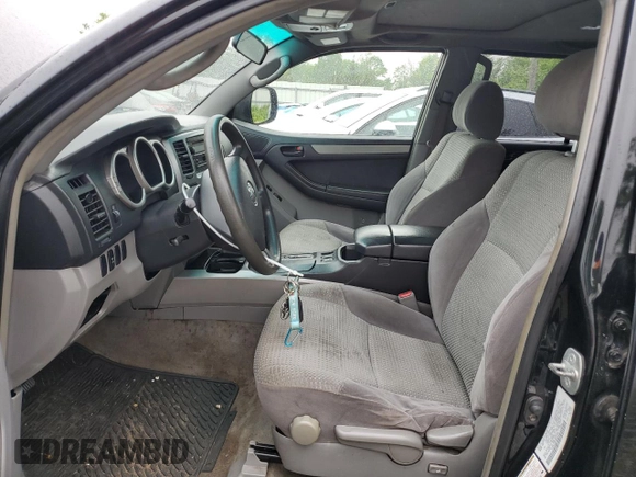 2004 Toyota 4Runner SR5 with VIN JTEBU14R448018046, listed as a Copart auction lot 55977005 with 226,004 mi miles and Salvage title. Bid and sale history available at DreamBid. Image 7.