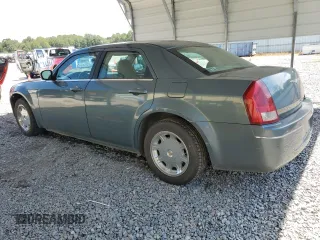 2005 Chrysler 300 Touring z VIN 2C3JA53G65H574021, wystawiony jako Copart lot #70073414 z przebiegiem 291 219 mil mil oraz Szkoda całkowita • Salvage title. Historia ofert i sprzedaży dostępna na DreamBid. Obrazek 2.