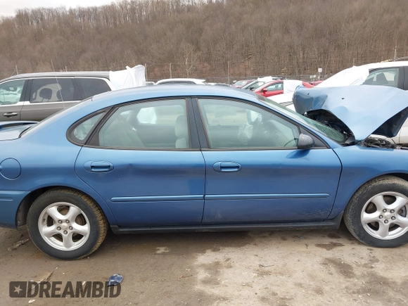 2004 Ford Taurus SE with VIN 1FAFP53U74A140294, listed as a IAAI auction lot 41630953 with Not Provided miles and . Bid and sale history available at DreamBid. Image 14.