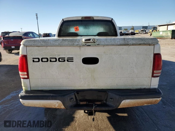 2001 Dodge Dakota z VIN 1B7HL2AX41S256519, wystawiony jako Copart lot #81951634 z przebiegiem Nie podano mil oraz Nie do naprawy • Non repairable. Historia ofert i sprzedaży dostępna na DreamBid. Obrazek 6.