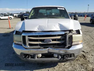 2003 Ford F-350 XL with VIN 1FTSW30F63EB07672, listed as a Copart auction lot 76659184 with 243,580 mi miles and Salvage Title. Bid and sale history available at DreamBid. Image 5.