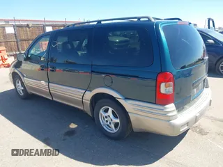 1999 Pontiac Montana with VIN 1GMDX03E0XD166084, listed as a IAAI auction lot 41872976 with 196,027 mi miles and . Bid and sale history available at DreamBid. Image 3.