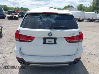 2017 BMW X5 xDrive35i z VIN 5UXKR0C30H0X79365, wystawiony jako IAAI lot #42209393 z przebiegiem Nie podano mil oraz . Historia ofert i sprzedaży dostępna na DreamBid. Obrazek 16.