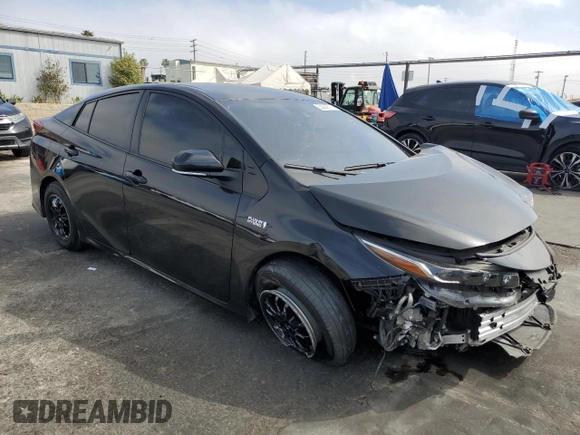 2021 Toyota Prius LE with VIN JTDKAMFP6M3169879, listed as a Copart auction lot 50259775 with 43,173 mi miles and Salvage Title. Bid and sale history available at DreamBid. Image 4.