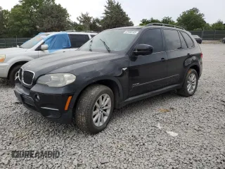 2012 BMW X5 35i with VIN 5UXZV4C59CL763577, listed as a Copart auction lot 62496155 with 148,240 mi miles and Clean title. Bid and sale history available at DreamBid. Image 1.