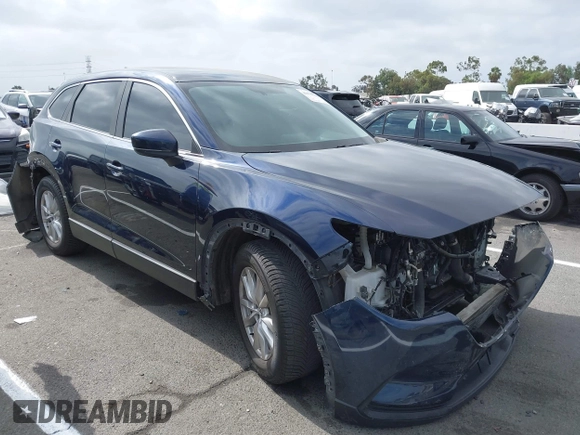 2016 Mazda CX-9 Sport with VIN JM3TCABY3G0123239, listed as a IAAI auction lot 42570700 with 119,414 mi miles and . Bid and sale history available at DreamBid. Image 1.