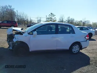 2011 Nissan Versa 1.8 S with VIN 3N1BC1AP5BL390720, listed as a IAAI auction lot 41962212 with 120,516 mi miles. Bid and sale history available at carsss.com. Image 14.