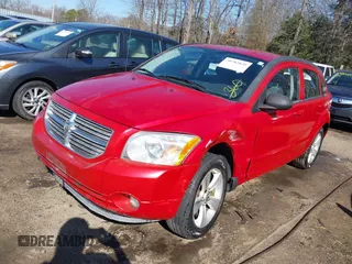 2012 Dodge Caliber SXT with VIN 1C3CDWDA7CD533844, listed as a IAAI auction lot 41391978 with 149,762 mi miles and . Bid and sale history available at DreamBid. Image 2.
