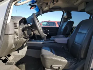 2007 Nissan Titan XE with VIN 1N6BA07A17N218723, listed as a Copart auction lot 43451135 with 202,747 mi miles and Salvage Title. Bid and sale history available at carsss.com. Image 7.