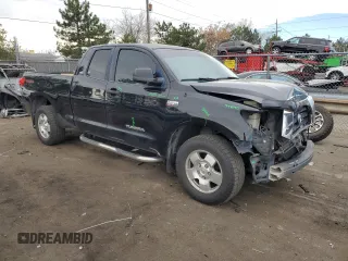 2009 Toyota Tundra 4WD Truck with VIN 5TFBW54139X091759, listed as a Copart auction lot 81697254 with 142,707 mi miles and Salvage Title. Bid and sale history available at carsss.com. Image 4.