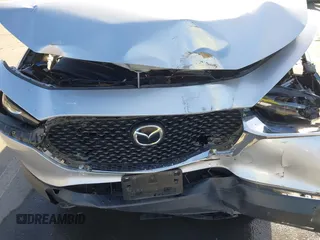2021 Mazda CX-30 Select with VIN 3MVDMABL9MM256321, listed as a IAAI auction lot 41057613 with Not Provided miles and . Bid and sale history available at DreamBid. Image 6.