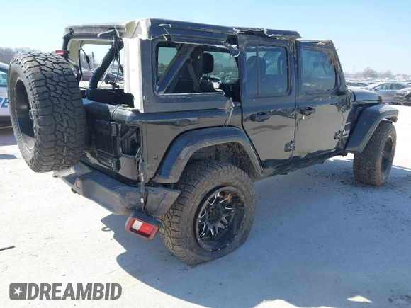 2019 Jeep Wrangler Unlimited Sahara with VIN 1C4HJXEG5KW518202, listed as a IAAI auction lot 41762229 with 91,995 mi miles and . Bid and sale history available at DreamBid. Image 4.