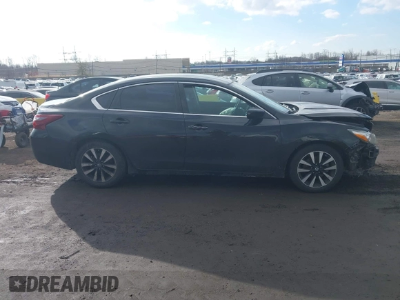 2018 Nissan Altima SV with VIN 1N4AL3AP1JC234615, listed as a IAAI auction lot 41665546 with 74,434 mi miles and . Bid and sale history available at DreamBid. Image 12.