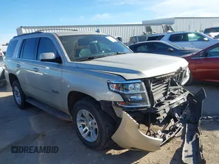2017 Chevrolet Tahoe LT z VIN 1GNSCBKC5HR363668, wystawiony jako IAAI lot #41057398 z przebiegiem 125 944 mil mil oraz . Historia ofert i sprzedaży dostępna na DreamBid. Obrazek 1.