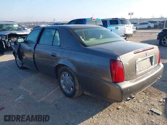 2002 Cadillac DeVille DHS z VIN 1G6KE57Y52U283531, wystawiony jako IAAI lot #41640930 z przebiegiem 94 435 mil mil oraz . Historia ofert i sprzedaży dostępna na DreamBid. Obrazek 3.
