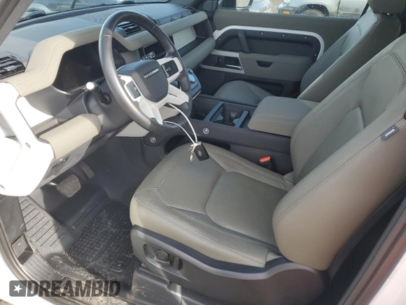 2023 Land Rover Defender S with VIN SALEJ6EX7P2227141, listed as a Copart auction lot 50351785 with 8,810 mi miles and Salvage title. Bid and sale history available at DreamBid. Image 7.