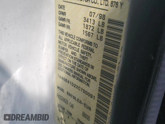 1999 Nissan Sentra XE with VIN 1N4AB41D2XC700091, listed as a Copart auction lot 59734435 with 53,658 mi miles and Salvage title. Bid and sale history available at DreamBid. Image 13.