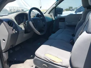 2004 Ford F-150 STX with VIN 1FTRX12WX4NA91393, listed as a IAAI auction lot 42169838 with 259,197 mi miles and . Bid and sale history available at carsss.com. Image 12.