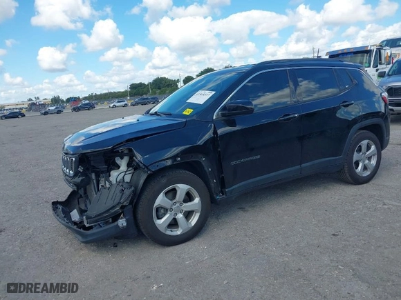 2020 Jeep Compass Latitude w/Sun/Safety Pkg with VIN 3C4NJCBB4LT253364, listed as a IAAI auction lot 41565377 with 60,551 mi miles. Bid and sale history available at carsss.com. Image 2.