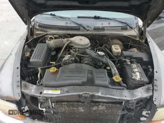 2002 Dodge Dakota с VIN 1B7FL46XX2S511526, выставлен на аукционе Copart как лот 57955594 с пробегом 244 367 миль миль и Списание • Salvage title. История ставок и продаж доступна на DreamBid. Изображение 11.