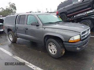 2004 Dodge Dakota Sport with VIN 1D7HL38N94S651302, listed as a IAAI auction lot 41504334 with 1 mi miles. Bid and sale history available at carsss.com. Image 1.