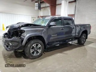 2017 Toyota Tacoma SR5 with VIN 3TMDZ5BN0HM034803, listed as a Copart auction lot 63075485 with 91,734 mi miles and Salvage title. Bid and sale history available at DreamBid. Image 1.