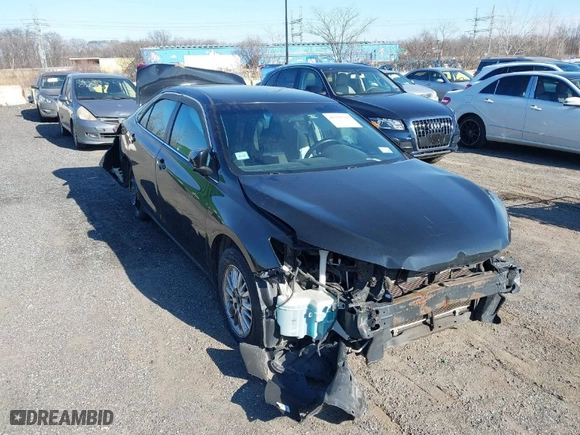 2015 Toyota Camry Hybrid LE with VIN 4T1BD1FK5FU170038, listed as a IAAI auction lot 41751734 with 292,193 mi miles. Bid and sale history available at carsss.com. Image 1.