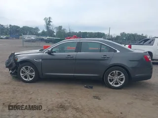 2018 Ford Taurus SEL with VIN 1FAHP2H8XJG135277, listed as a IAAI auction lot 42606524 with 27,103 mi miles and . Bid and sale history available at DreamBid. Image 14.