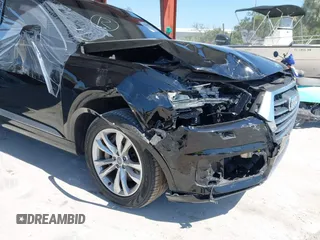 2017 Audi Q7 Premium Plus with VIN WA1LHAF75HD040203, listed as a IAAI auction lot 42064687 with 100,845 mi miles and . Bid and sale history available at DreamBid. Image 6.