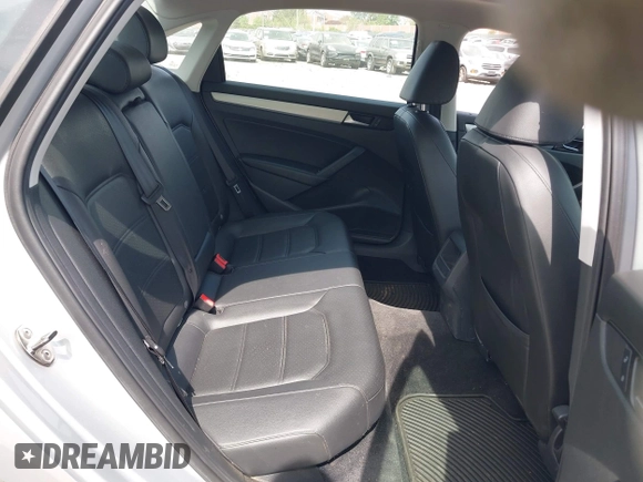 2012 Volkswagen Passat SE with VIN 1VWBP7A32CC101143, listed as a IAAI auction lot 42124955 with 64,843 mi miles. Bid and sale history available at carsss.com. Image 8.