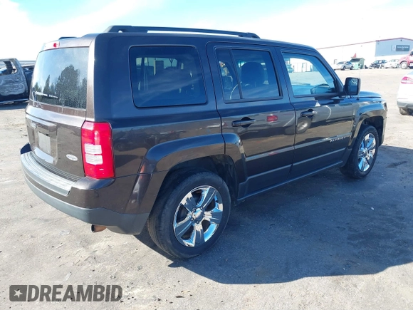 2014 Jeep Patriot High Altitude with VIN 1C4NJPFA7ED851059, listed as a IAAI auction lot 41306629 with 156,270 mi miles and . Bid and sale history available at carsss.com. Image 4.