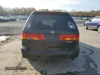 2003 Honda Odyssey EX-L with VIN 5FNRL189X3B114181, listed as a Copart auction lot 54316105 with 103,214 mi miles and Salvage Title. Bid and sale history available at DreamBid. Image 6.